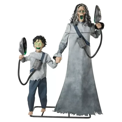 Studio packshot: the pair hand in hand on one metal frame, masks lowered and both faces lit green