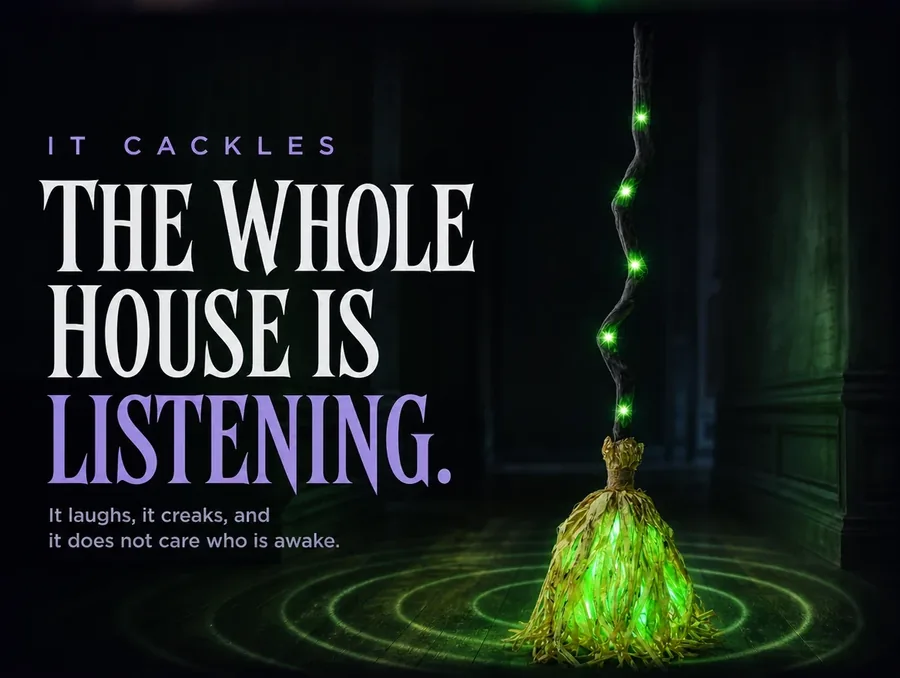 The broom lit green in a dark hallway, faint rings of light rippling outward across the floor around it